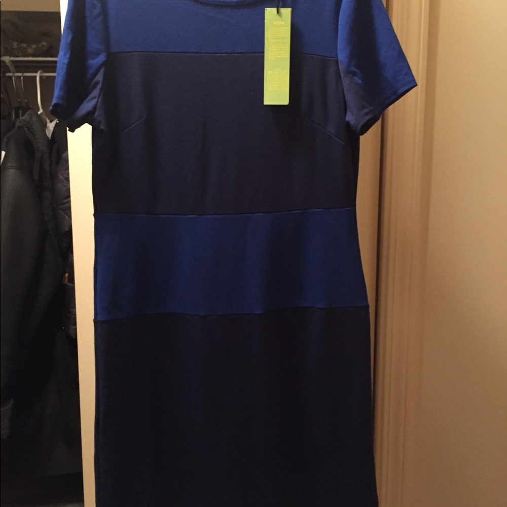 Brand new dress with tags, zip design on the back